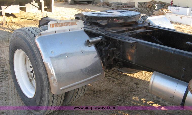 image for item 8149 1995 International 4700 single axle semi truck