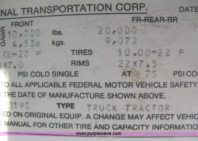 image for item 8149 1995 International 4700 single axle semi truck