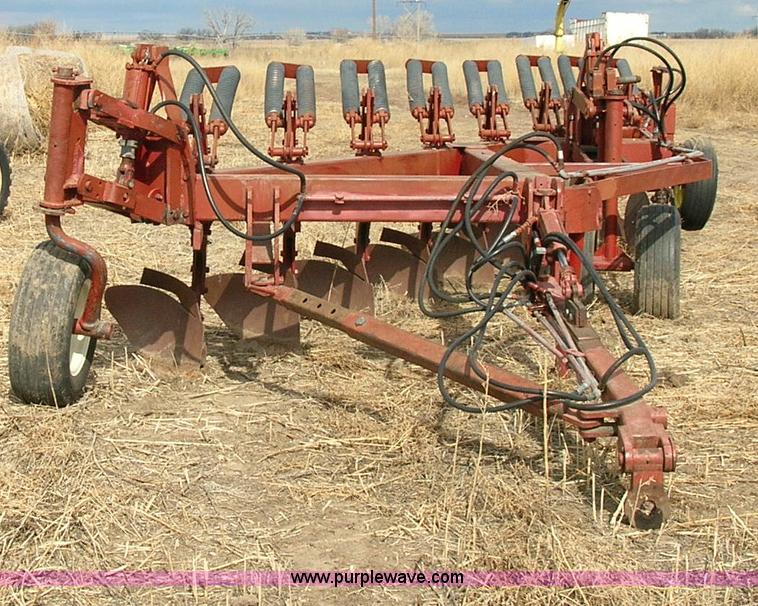 image for item 3427 Eight bottom plow