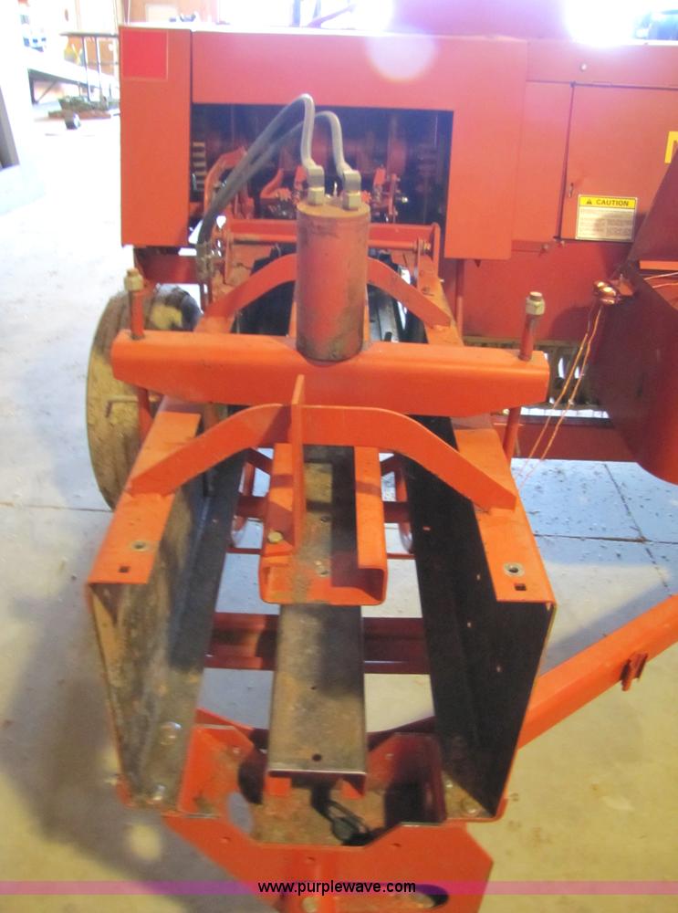image for item 5203 New Holland 575 small square baler