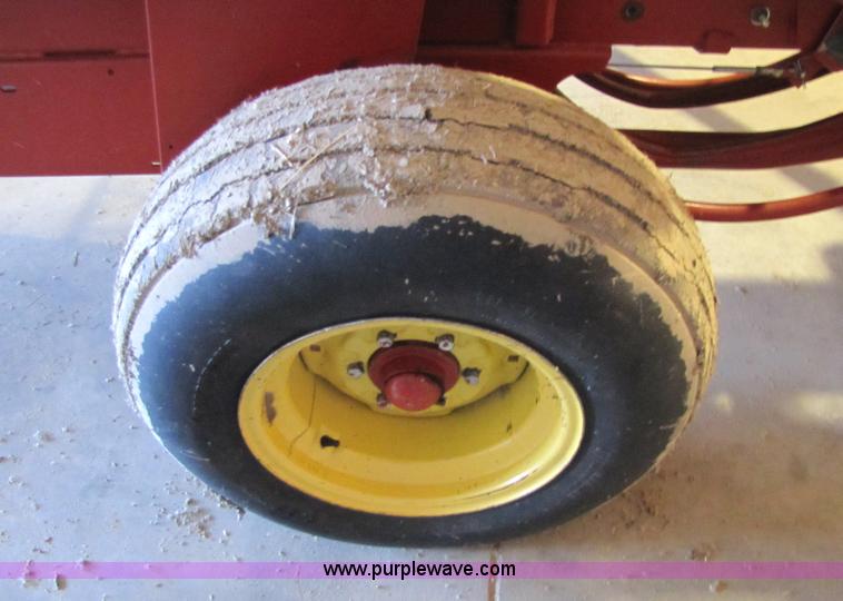 image for item 5203 New Holland 575 small square baler