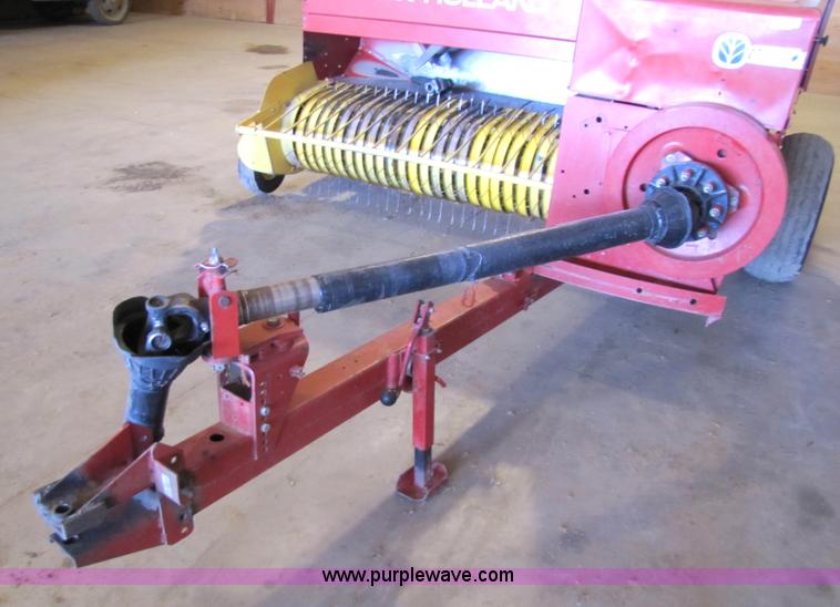 image for item 5203 New Holland 575 small square baler