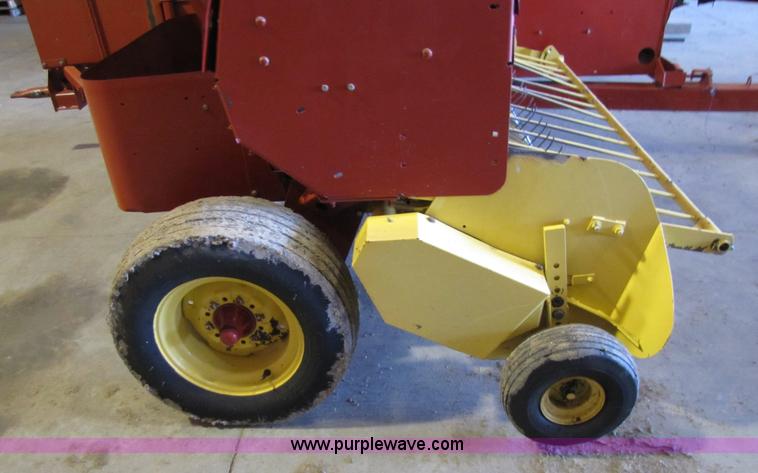 image for item 5203 New Holland 575 small square baler