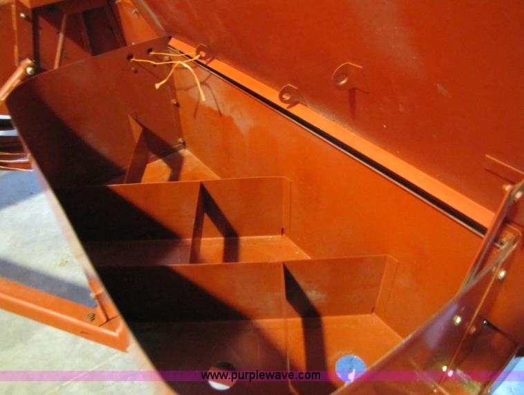 image for item 5203 New Holland 575 small square baler