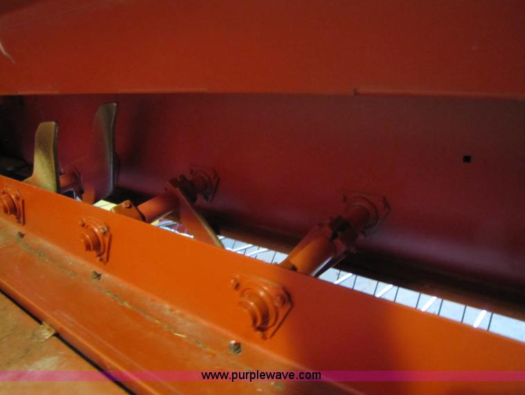 image for item 5203 New Holland 575 small square baler