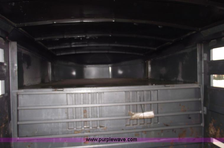 image for item 5369 2007 Titan triple axle stock trailer