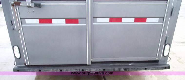 image for item 5369 2007 Titan triple axle stock trailer