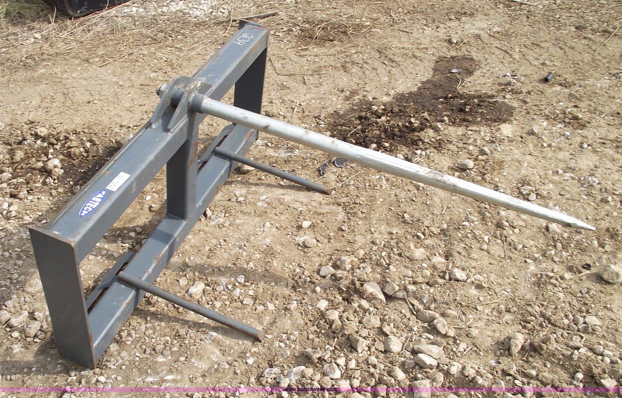 FabTeck skidsteer bale spike in Fulton, MO Item 5436 sold Purple Wave