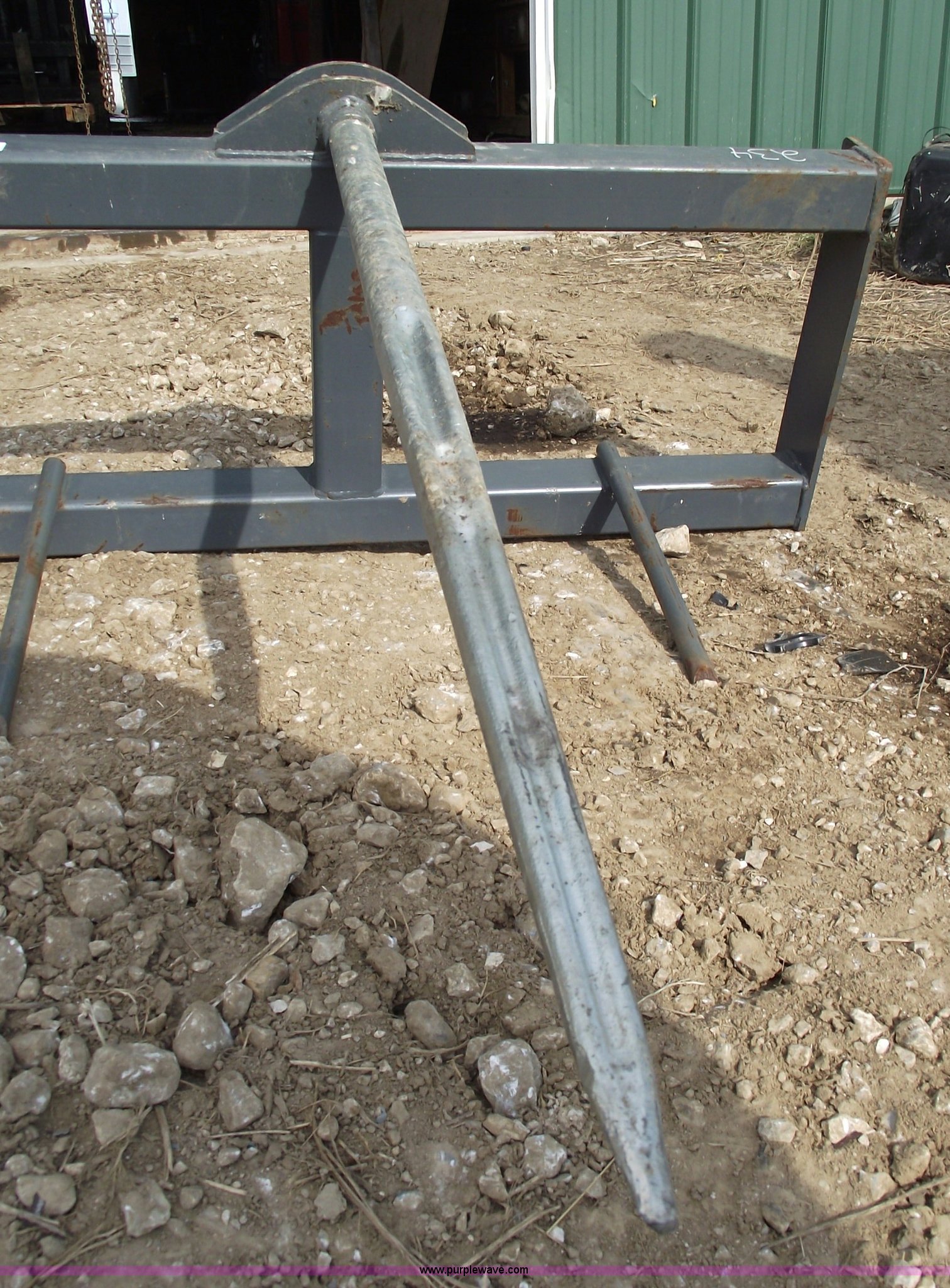 FabTeck skidsteer bale spike in Fulton, MO Item 5436 sold Purple Wave