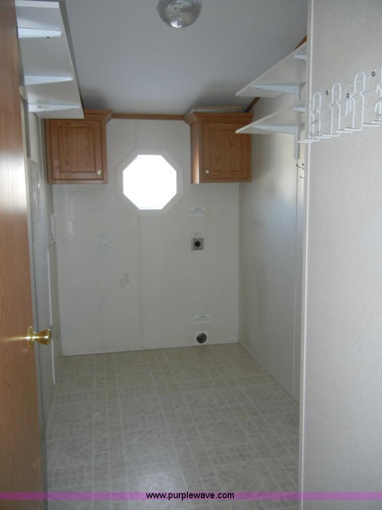 image for item 2139 2003 Skyline Fairview 76' modular home