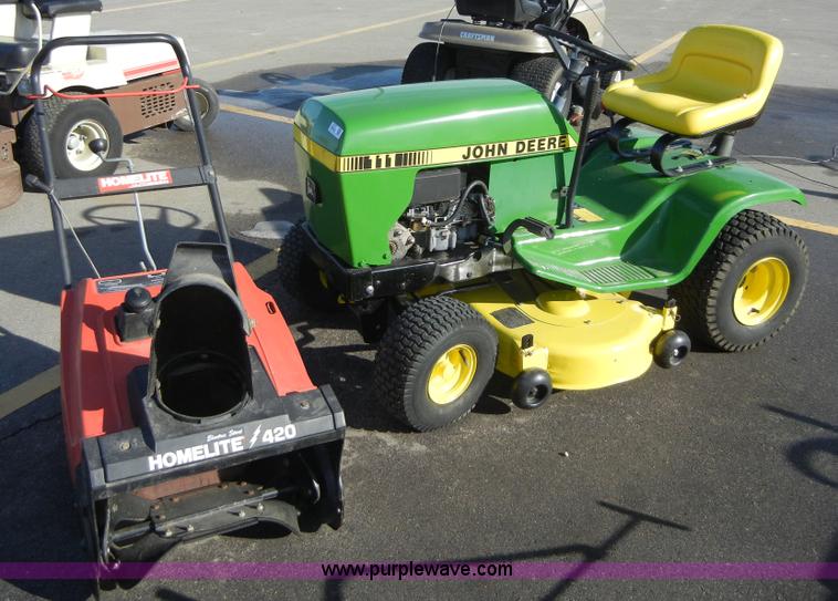 image for item 2223 John Deere 111 lawn mower