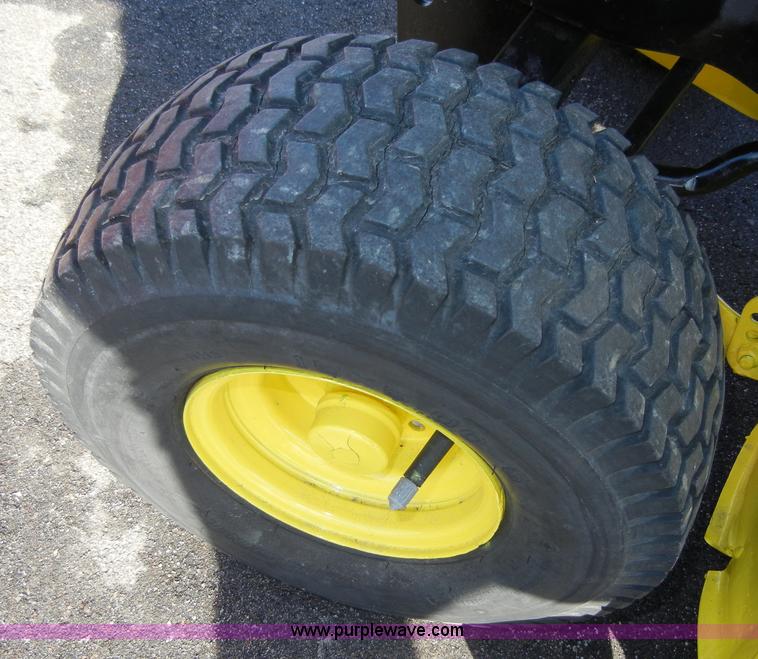 image for item 2223 John Deere 111 lawn mower