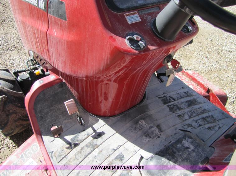 Case IH DX24 garden tractor with mower deck in Wamego, KS Item 5189 sold Purple Wave