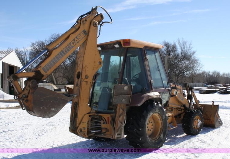 image for item 4832 Case 580K loader backhoe