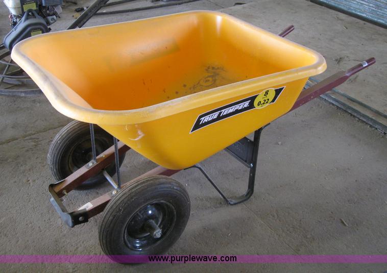 image for item 4869 Two tire poly wheel barrow
