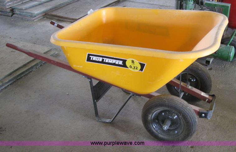 image for item 4869 Two tire poly wheel barrow