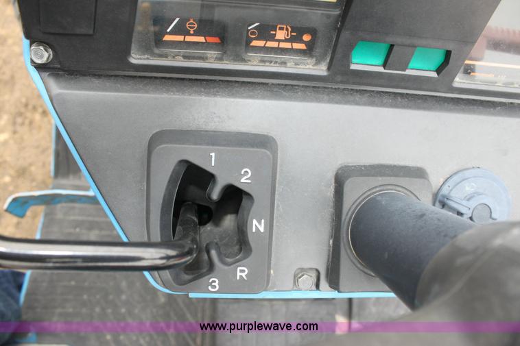 image for item 3063 1998 Ford New Holland 1320 tractor