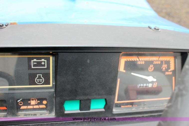 image for item 3063 1998 Ford New Holland 1320 tractor