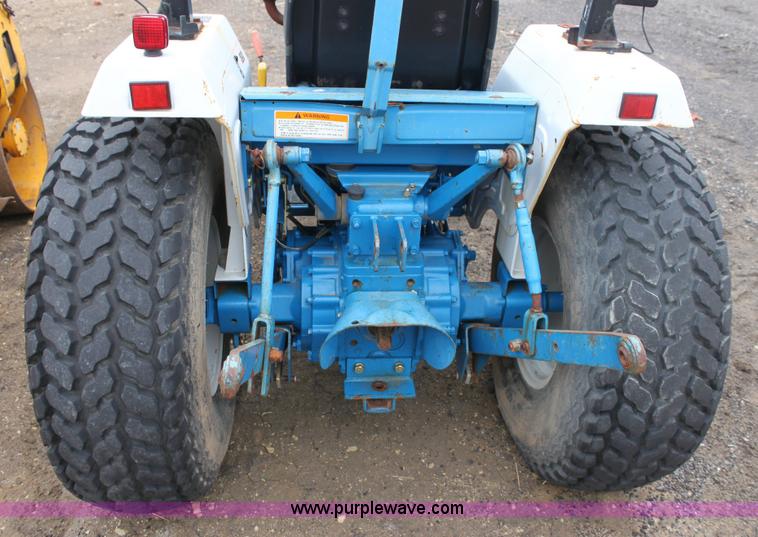 image for item 3063 1998 Ford New Holland 1320 tractor