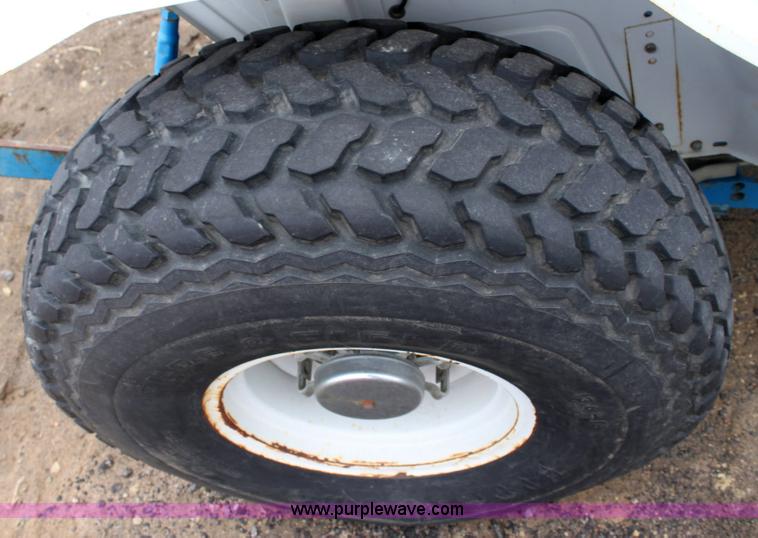 image for item 3063 1998 Ford New Holland 1320 tractor