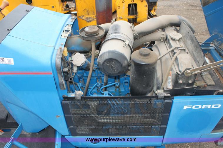 image for item 3063 1998 Ford New Holland 1320 tractor