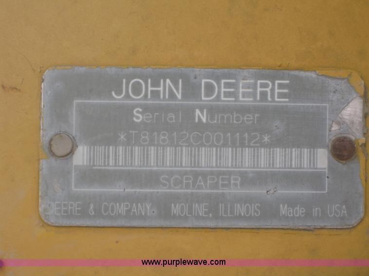 image for item 1603 2000 John Deere 1812C pull type pivot scraper