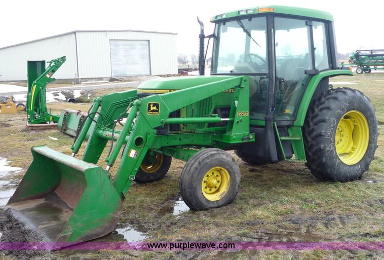 image for item 2750 1995 John Deere 6300 tractor with loader