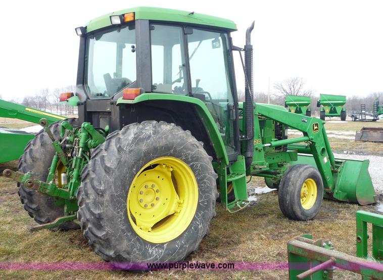 image for item 2750 1995 John Deere 6300 tractor with loader