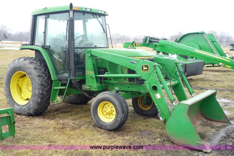 image for item 2750 1995 John Deere 6300 tractor with loader