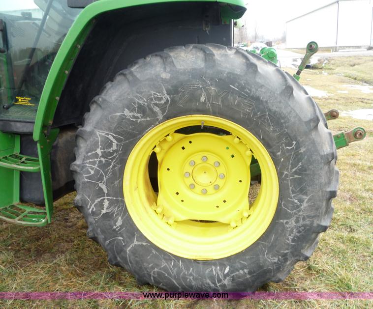 image for item 2750 1995 John Deere 6300 tractor with loader