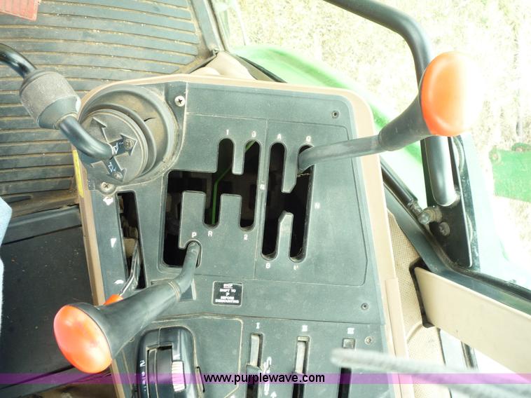 image for item 2750 1995 John Deere 6300 tractor with loader