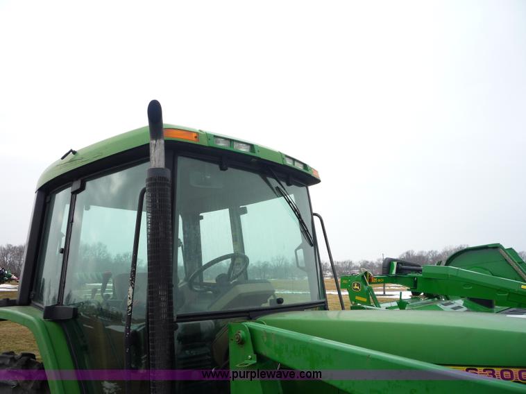 image for item 2750 1995 John Deere 6300 tractor with loader