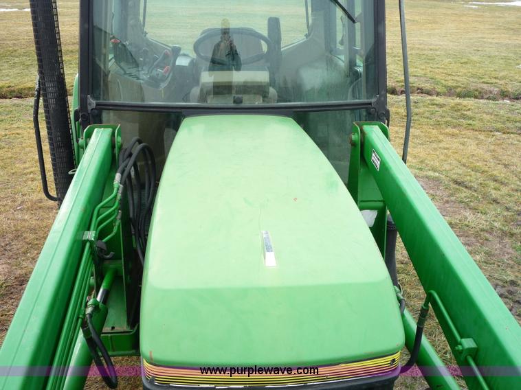 image for item 2750 1995 John Deere 6300 tractor with loader