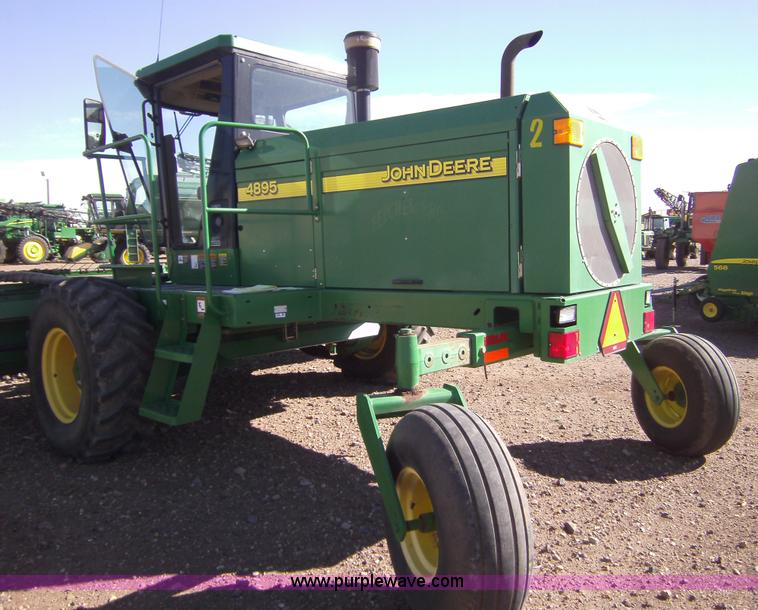 image for item 3460 2002 John Deere 4895 windrower with 895 18' platform
