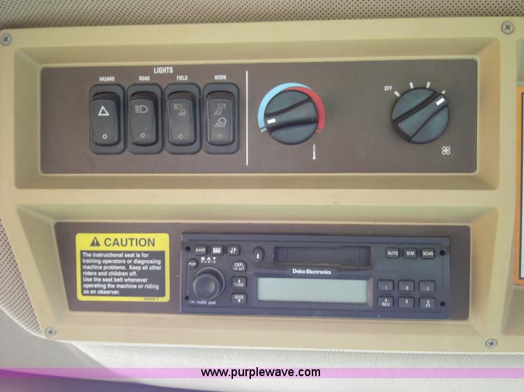 image for item 3460 2002 John Deere 4895 windrower with 895 18' platform