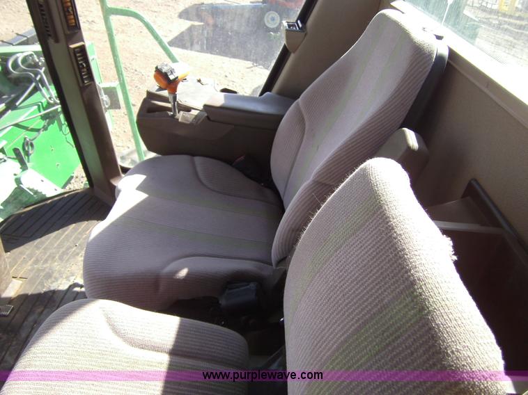 image for item 3460 2002 John Deere 4895 windrower with 895 18' platform