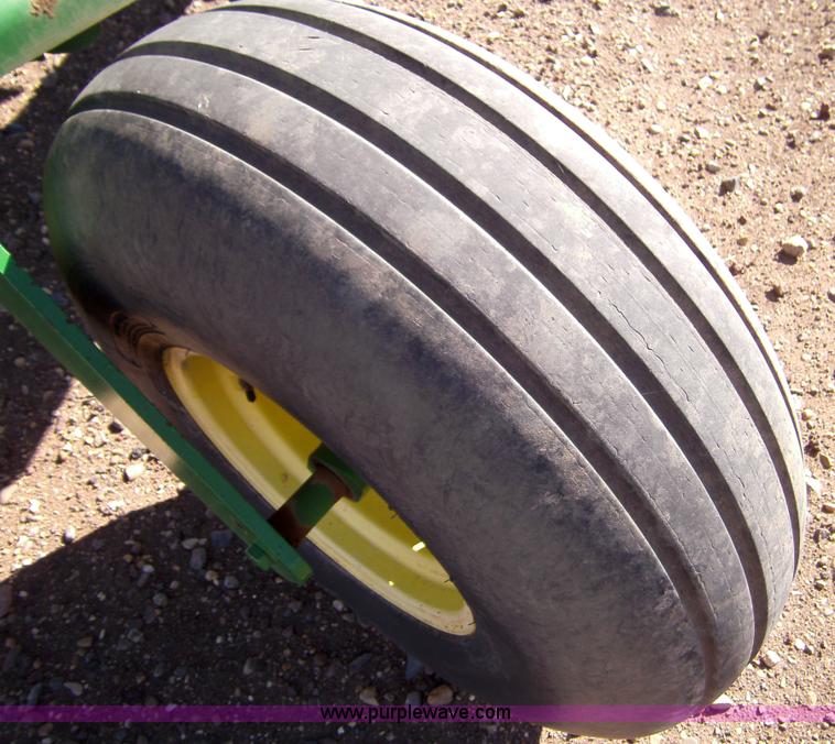 image for item 3460 2002 John Deere 4895 windrower with 895 18' platform