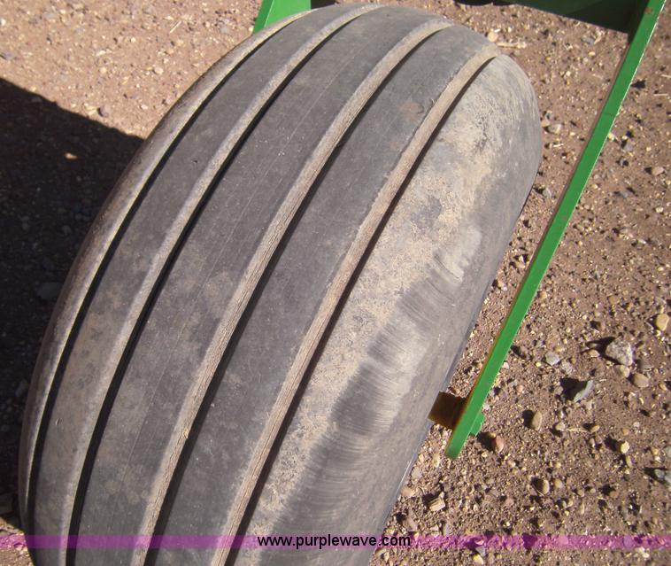 image for item 3460 2002 John Deere 4895 windrower with 895 18' platform