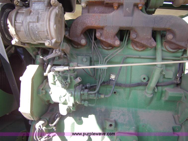 image for item 3460 2002 John Deere 4895 windrower with 895 18' platform