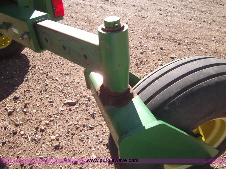 image for item 3460 2002 John Deere 4895 windrower with 895 18' platform