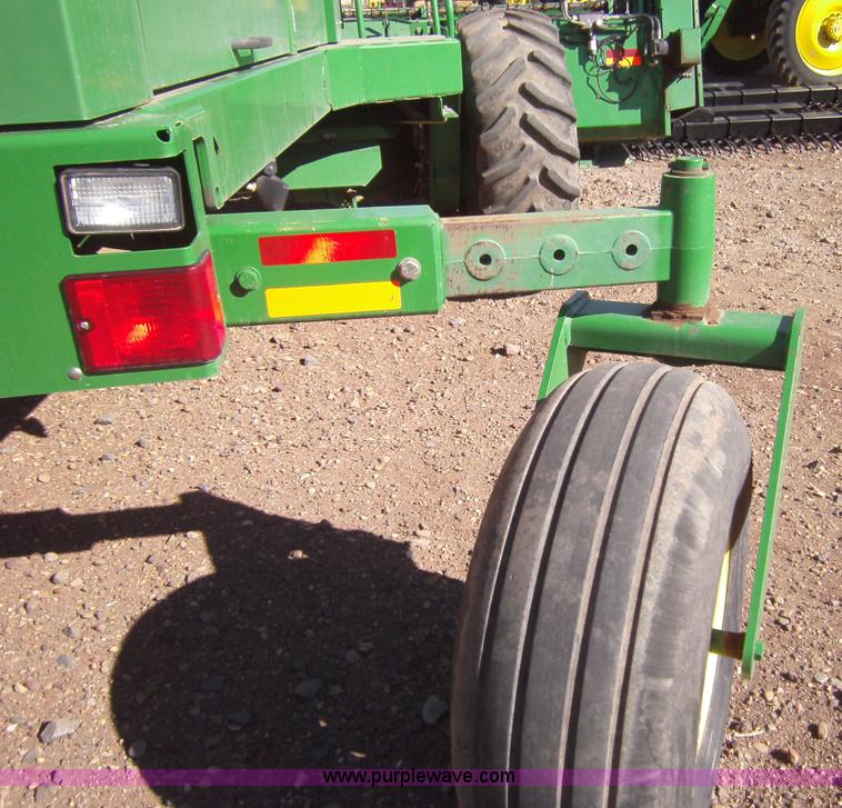 image for item 3460 2002 John Deere 4895 windrower with 895 18' platform