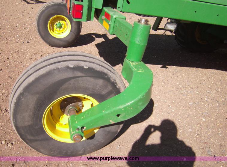 image for item 3460 2002 John Deere 4895 windrower with 895 18' platform