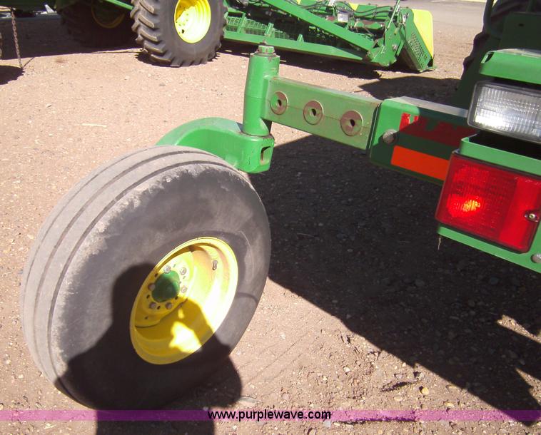 image for item 3460 2002 John Deere 4895 windrower with 895 18' platform