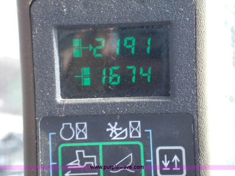 image for item 3460 2002 John Deere 4895 windrower with 895 18' platform