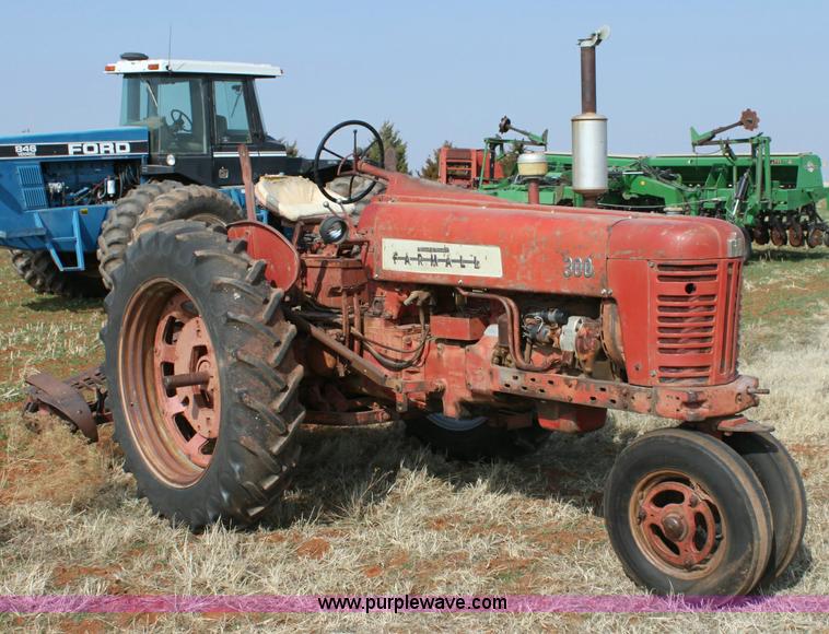 image for item 6901 International Farmall 300 tractor with attachments