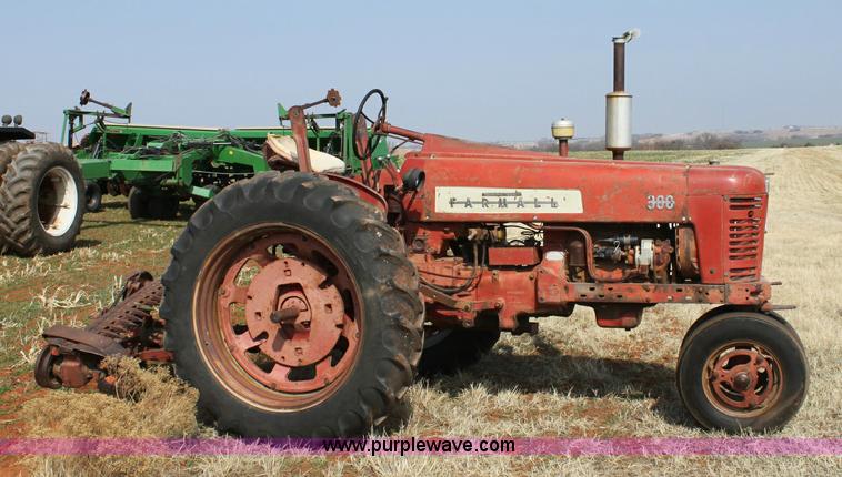 image for item 6901 International Farmall 300 tractor with attachments