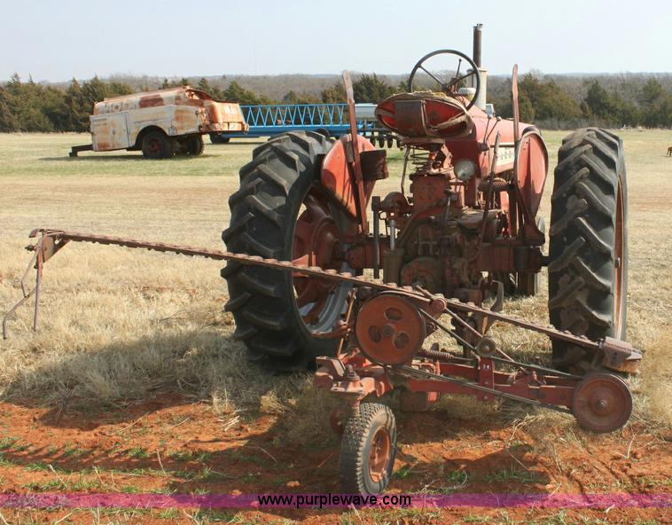 image for item 6901 International Farmall 300 tractor with attachments