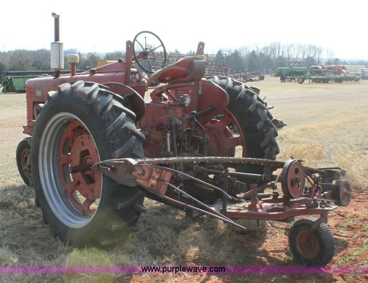 image for item 6901 International Farmall 300 tractor with attachments