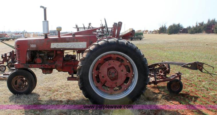 image for item 6901 International Farmall 300 tractor with attachments