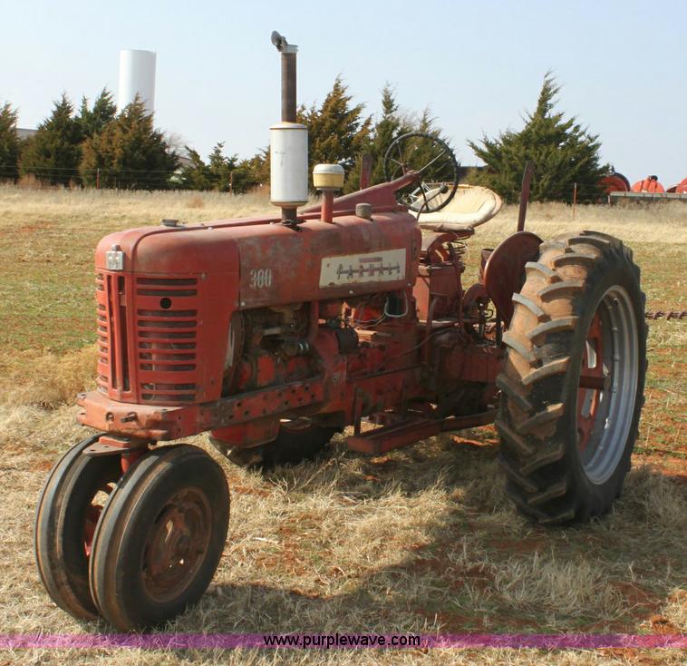 image for item 6901 International Farmall 300 tractor with attachments